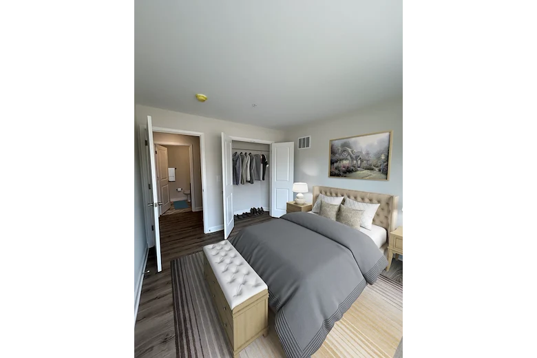 Willow Manor at Cabin Branch senior living community offering independent living and affordable living in Clarksburg, MD, apartment bedroom and closet