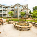 Providence Meadows Gracious Retirement Living Hawthorn Senior Independent Living in Charlotte, North Carolina rear exterior firepit patio