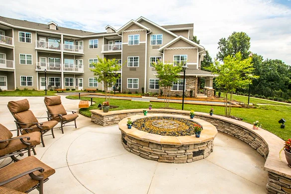 Providence Meadows Gracious Retirement Living Hawthorn Senior Independent Living in Charlotte, North Carolina rear exterior firepit patio