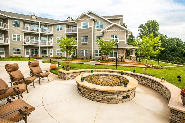 Providence Meadows Gracious Retirement Living Hawthorn Senior Independent Living in Charlotte, North Carolina rear exterior firepit patio