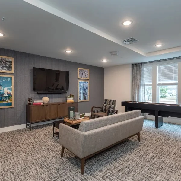 Acclaim at Greenbrier, senior living community offering active adult and independent living in Chesapeake, VA, cozy sitting area with tv
