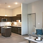 Astral at Auburn, senior living community offering independent living, assisted living, and memory care in Auburn, IN, apartment kitchen with stainless steel appliances