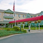 Avamere at Englewood Heights senior living community offering assisted living, memory care, and respite care in Yakima, WA, front exterior and entrance