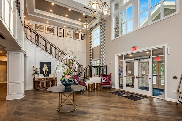 The Commons on Meridian Senior Living in Indianapolis, IN interior entrance with staircase