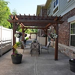 Allisonville Meadows Assisted Living offering assisted living, memory care, and respite care in Fishers, IN, outdoor patio seating area featuring a gazebo