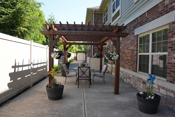 Allisonville Meadows Assisted Living offering assisted living, memory care, and respite care in Fishers, IN, outdoor patio seating area featuring a gazebo