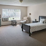 American House Elmwood, senior living community offering independent living, assisted living, memory care, and respite care in Rochester Hills, MI, apartment bedroom