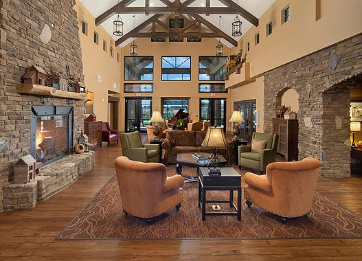 Alto Clermont, senior living community offering assisted living, memory care, and respite care in Clermont, FL, community gathering area with lots of seating