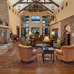 Alto Clermont, senior living community offering assisted living, memory care, and respite care in Clermont, FL, community gathering area with lots of seating