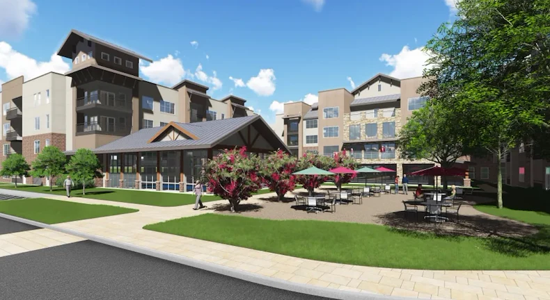 Watermere at the Preserve senior living community offering active adult living and independent living in North Richland Hills, TX, front exterior featuring an outdoor seating area