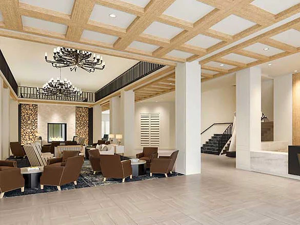 Wellington Bay with Lisbet Health Center senior living community offering independent living, assisted living, and memory care in Wellington, FL, common lounge area perfect for socializing