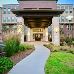 Active adult living and independent living at Watercrest at Shadow Creek Ranch in Pearland, TX, front exterior entrance