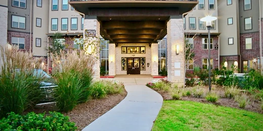 Active adult living and independent living at Watercrest at Shadow Creek Ranch in Pearland, TX, front exterior entrance