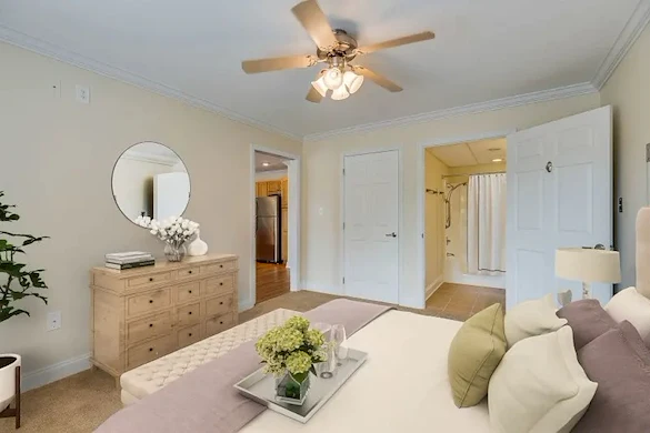 Asbury Place Kingsport, senior living community offering independent living, assisted living, and memory care in Kingsport, TN, bedroom with ensuite bathroom