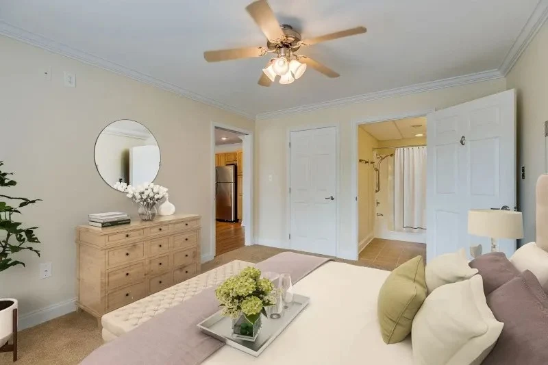 Asbury Place Kingsport, senior living community offering independent living, assisted living, and memory care in Kingsport, TN, bedroom with ensuite bathroom