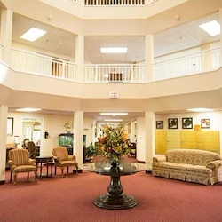 Independent living, assisted living, memory care, and continuing care retirement community (CCRC) at Brook Ridge-The Gardens Retirement Community in Pharr, TX, lobby sitting area