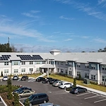 Banyan Reserve Seniors, senior living community offering active adult living and independent living in Lakeland, FL, exterior and parking lot