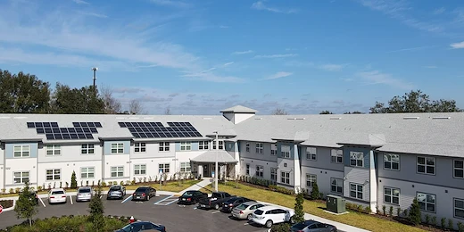 Banyan Reserve Seniors, senior living community offering active adult living and independent living in Lakeland, FL, exterior and parking lot