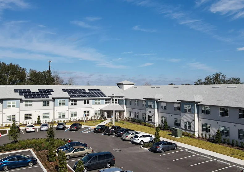 Banyan Reserve Seniors, senior living community offering active adult living and independent living in Lakeland, FL, exterior and parking lot