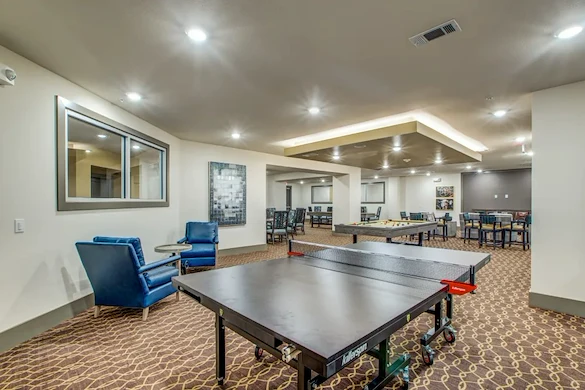 Watermere McKinney senior living community offering active adult living and independent living in McKinney, TX, activities room with table tennis