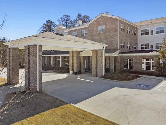 Alto Johns Creek, senior living community offering assisted living, memory care, and respite care in Duluth, GA, front entrance with covered drive-through