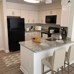 Willow Manor at Cabin Branch senior living community offering independent living and affordable living in Clarksburg, MD, apartment kitchen with modern touches
