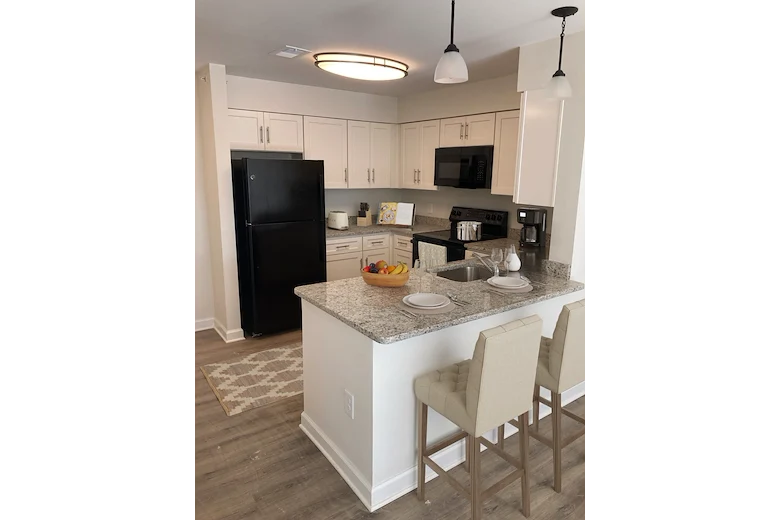 Willow Manor at Cabin Branch senior living community offering independent living and affordable living in Clarksburg, MD, apartment kitchen with modern touches
