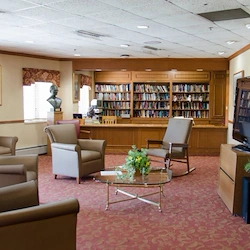 Ascension Casa Scalabrini Senior Living, independent senior living community in Northlake, IL, library and sitting area