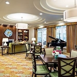 Sonata Windermere Assisted Senior Living in FL community room with piano