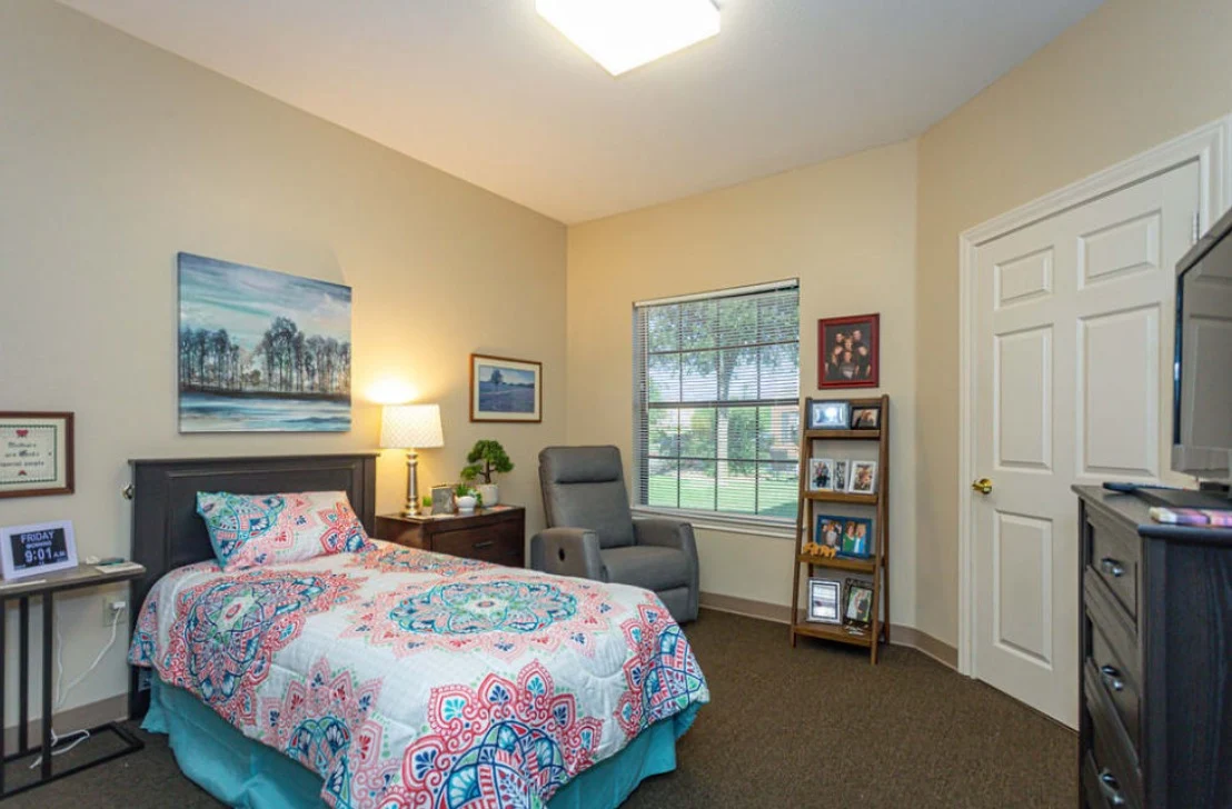 Assisted living and memory care at Bridgewater Memory Care in Granbury, TX, bedroom