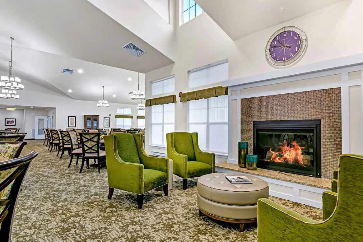 Bear Hollow Estates Hawthorn Senior Independent Living in Rancho Cordova, California, community sitting area by fireplace