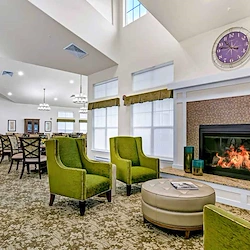 Bear Hollow Estates Hawthorn Senior Independent Living in Rancho Cordova, California, community sitting area by fireplace