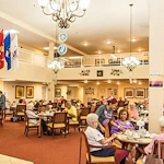 Independent living, assisted living, memory care, and continuing care retirement community (CCRC) at Brook Ridge-The Gardens Retirement Community in Pharr, TX, dining room