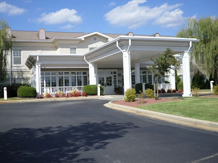 NHC Place Anniston's Logo