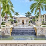 Allegro Boynton Beach, senior living community offering independent living, assisted living, memory care, and respite care in Boynton Beach, FL, grand front exterior with fountain