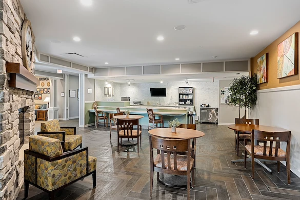 Alto Wheaton, senior living community offering assisted living, memory care, and respite care in Wheaton, IL, community gathering area with seating for socializing and activities