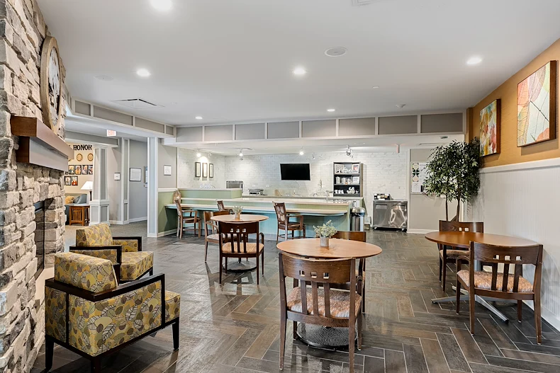 Alto Wheaton, senior living community offering assisted living, memory care, and respite care in Wheaton, IL, community gathering area with seating for socializing and activities