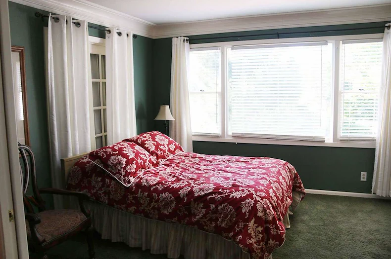 Legato Living Residential Memory Care at Legacy senior living community offering assisted living, memory care, adult day services, and respite care in Omaha, NE, bedroom with great natural lighting