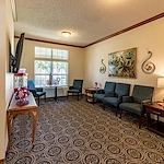 Ashbrook Village senior living community offering independent living, assisted living, and memory care in Duncan, OK, community movie room and sitting area