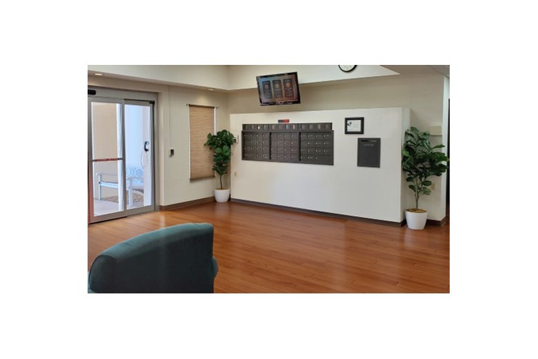 View #2 of Lobby & Sitting area in Manor III, US Post mail boxes