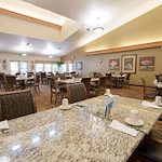 Wenatchee Senior Living by Cogir senior living community offering independent living, assisted living, and respite care in Wenatchee, WA, dining room with tables set
