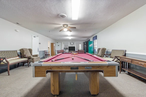 Charter Senior Living of Bowling Green activities room with pool table