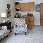 Brownsburg Meadows Assisted Senior Living in IN apartment living room and kitchenette