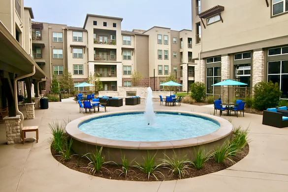 Active adult living and independent living at Watercrest at Shadow Creek Ranch in Pearland, TX, outdoor area with a water fountain