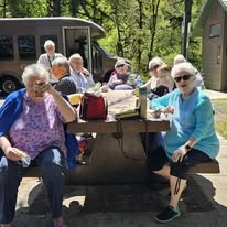 Gilman Grove Assisted Senior Living in Oregon City, Oregon residents eating lunch outside