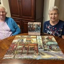Scholl Canyon Estates Gracious Retirement Living Hawthorn Senior Independent Living in Glendale, California residents solving a puzzle