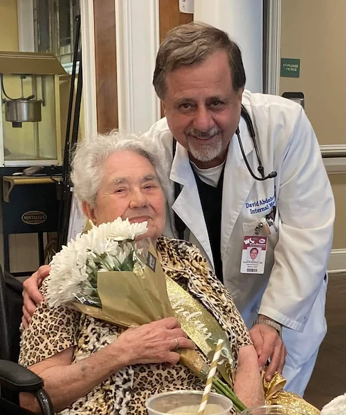 Montclair Park Assisted and Independent Senior Living in Shreveport, LA resident holding a bouquet