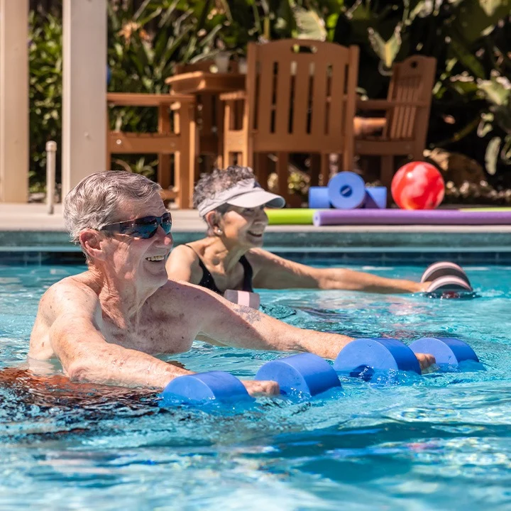 Rosewood Senior Living in Bakersfield, CA, residents during fitness class in the pool