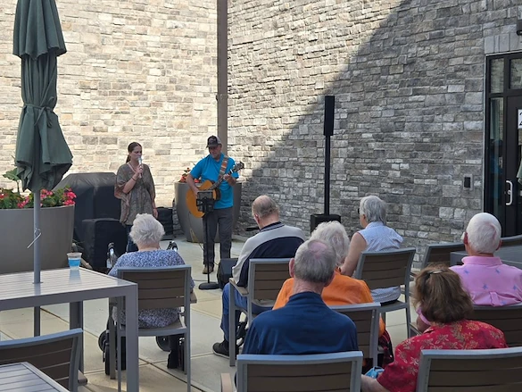 Astral at Franklin, senior living community offering independent living, assisted living, and memory care in Franklin, IN, residents enjoying entertainment