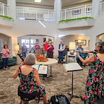 Desert Springs Gracious Retirement Living Hawthorn Senior Independent Living in Oro Valley, Arizona residents putting on a musical performance